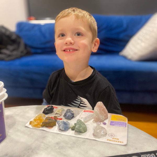 child learns colours using roxbox crystal mining bucket